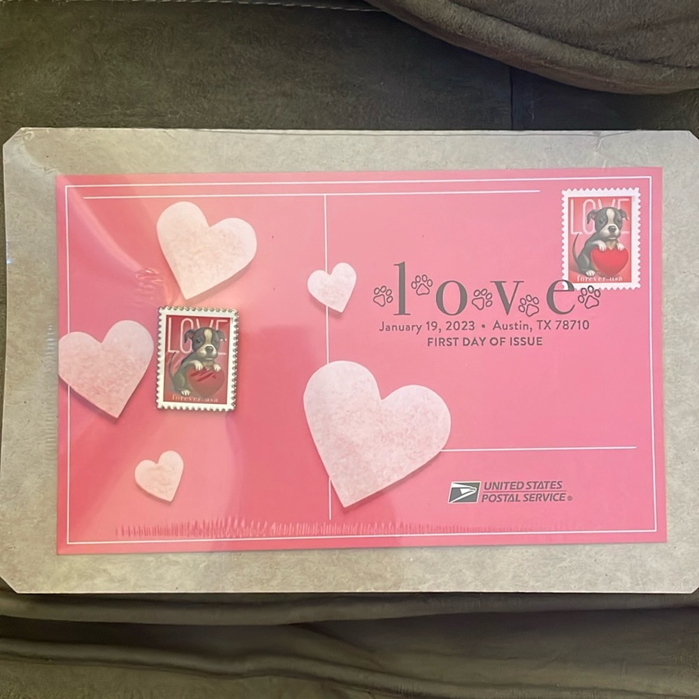 USPS Love stamped cancellation card and lapel pin